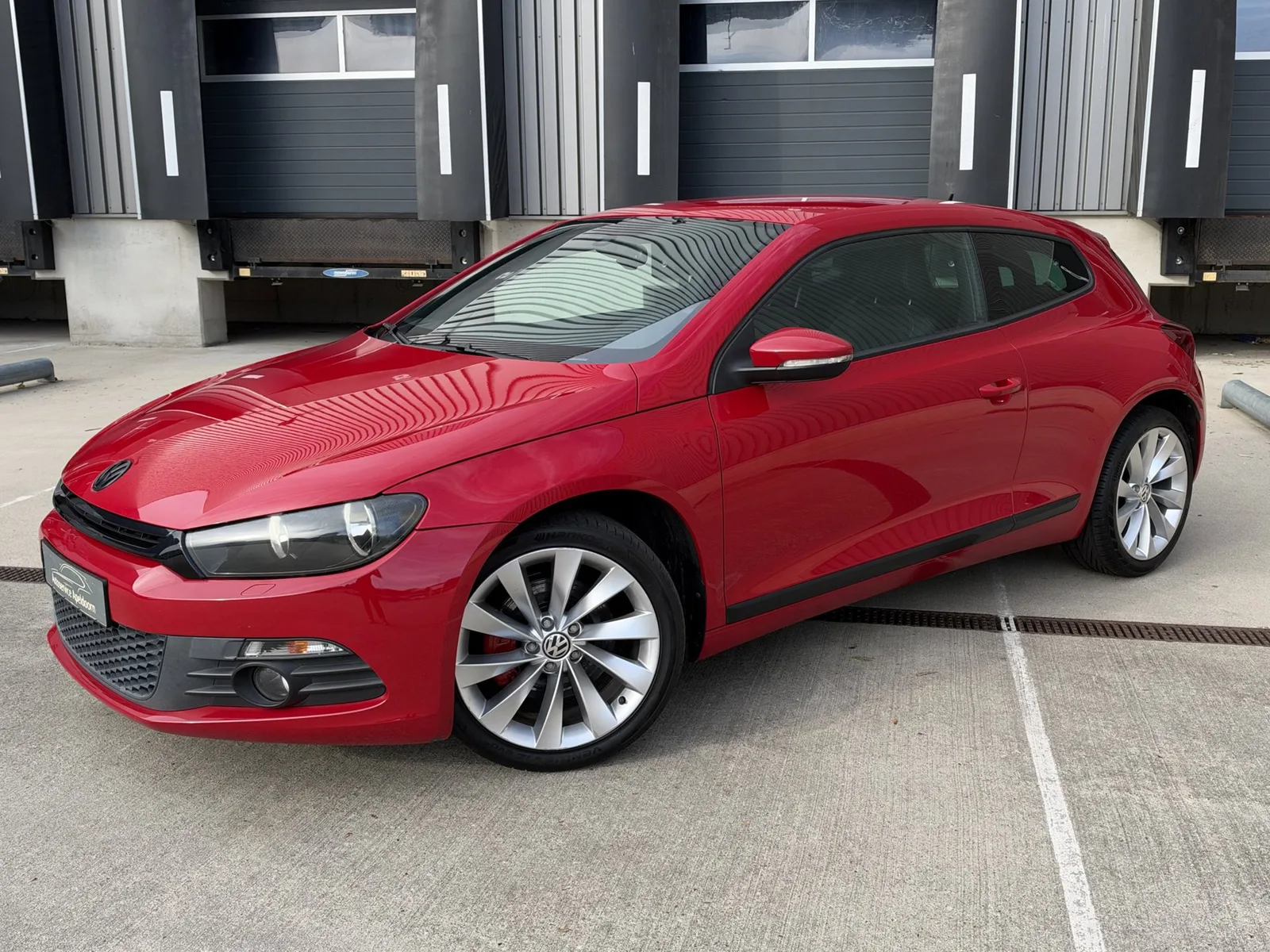 Volkswagen Scirocco (2011) — foto 1