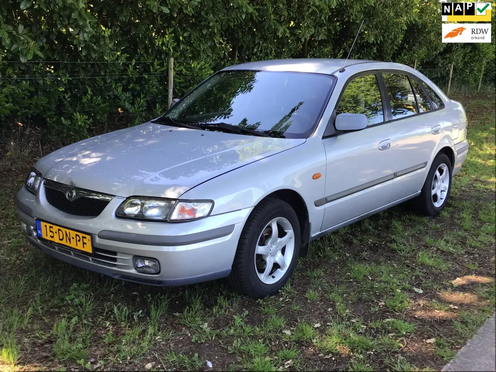Mazda 626 (1999) — foto 1