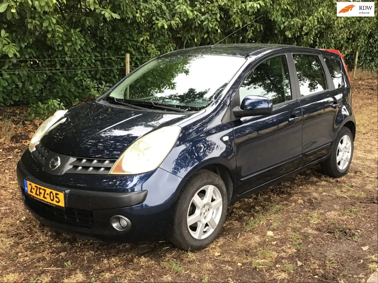 Nissan Note (2006) — foto 1