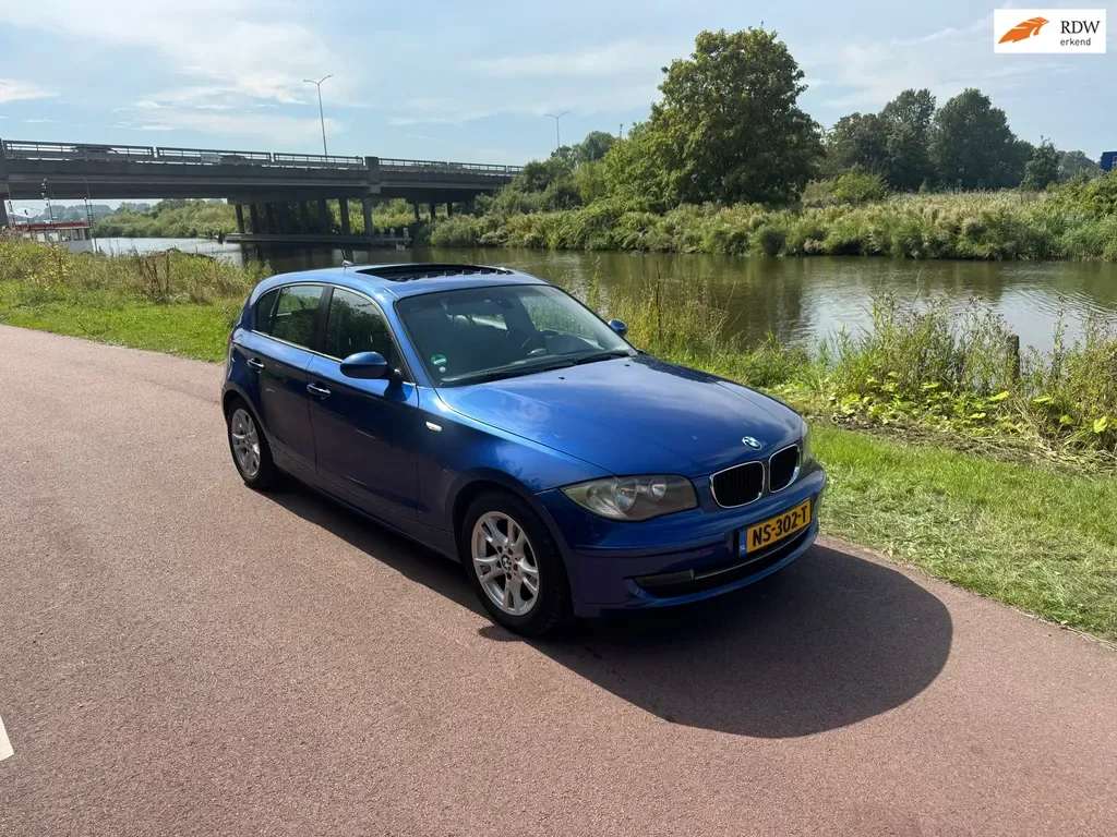 BMW 1-Serie (2009) — foto 1