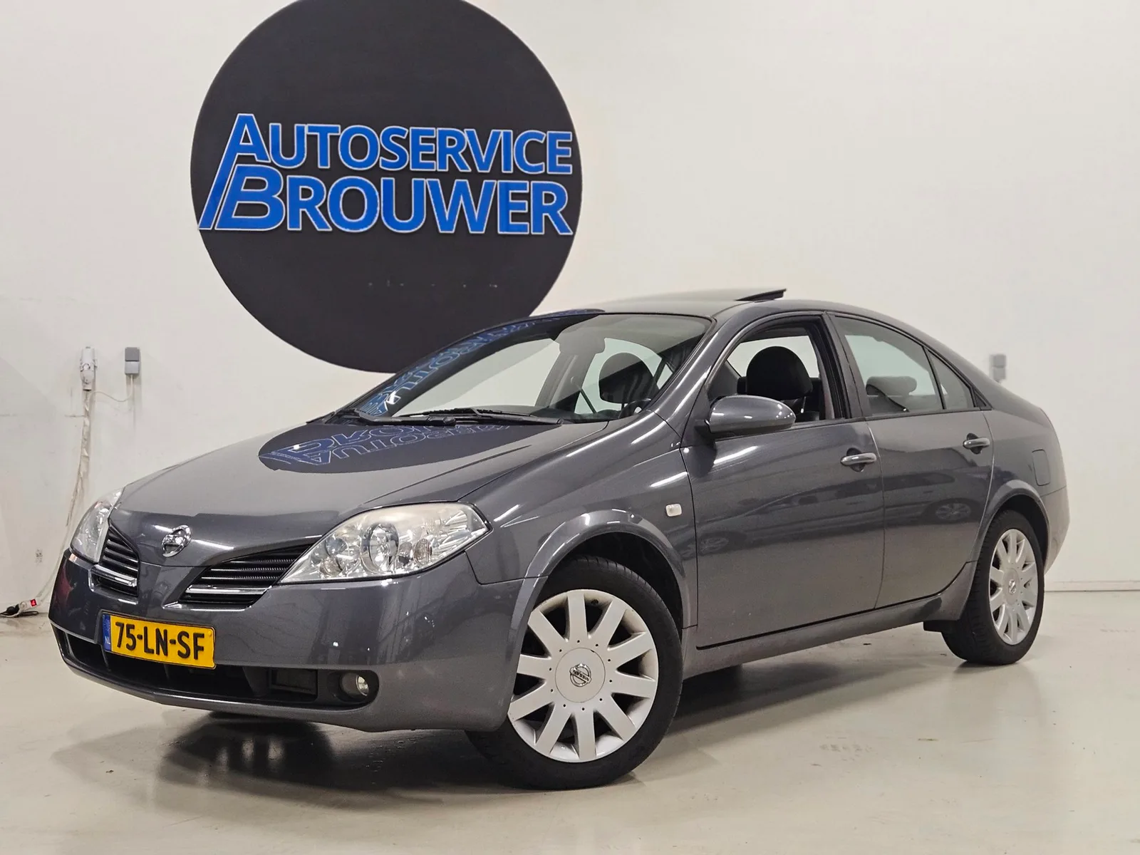 Nissan Primera (2003) — foto 1