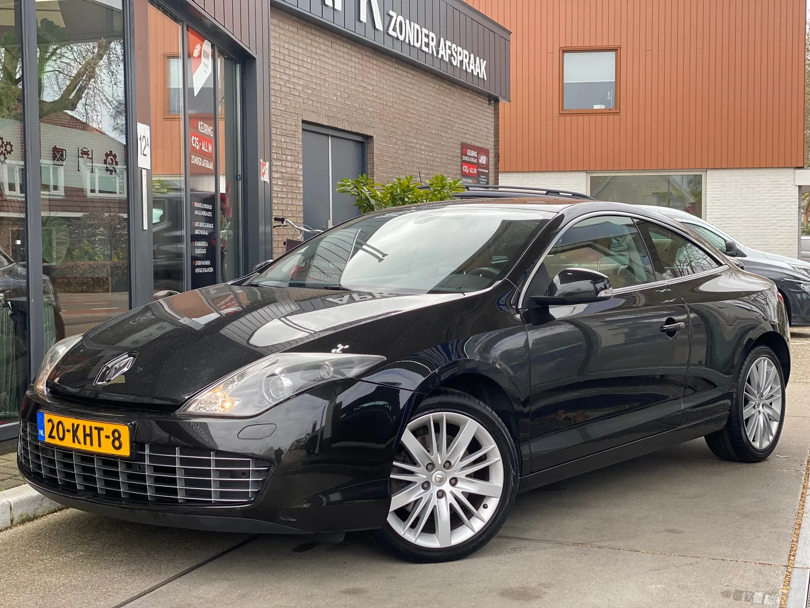 Renault Laguna (2009) — foto 1