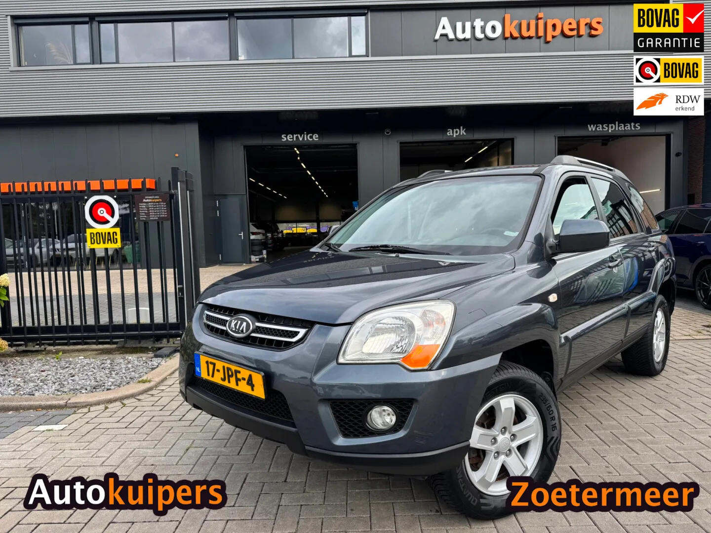 Kia Sportage (2009) — foto 1