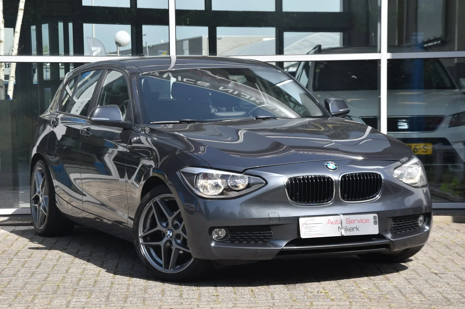 BMW 1-Serie (2011) — foto 1