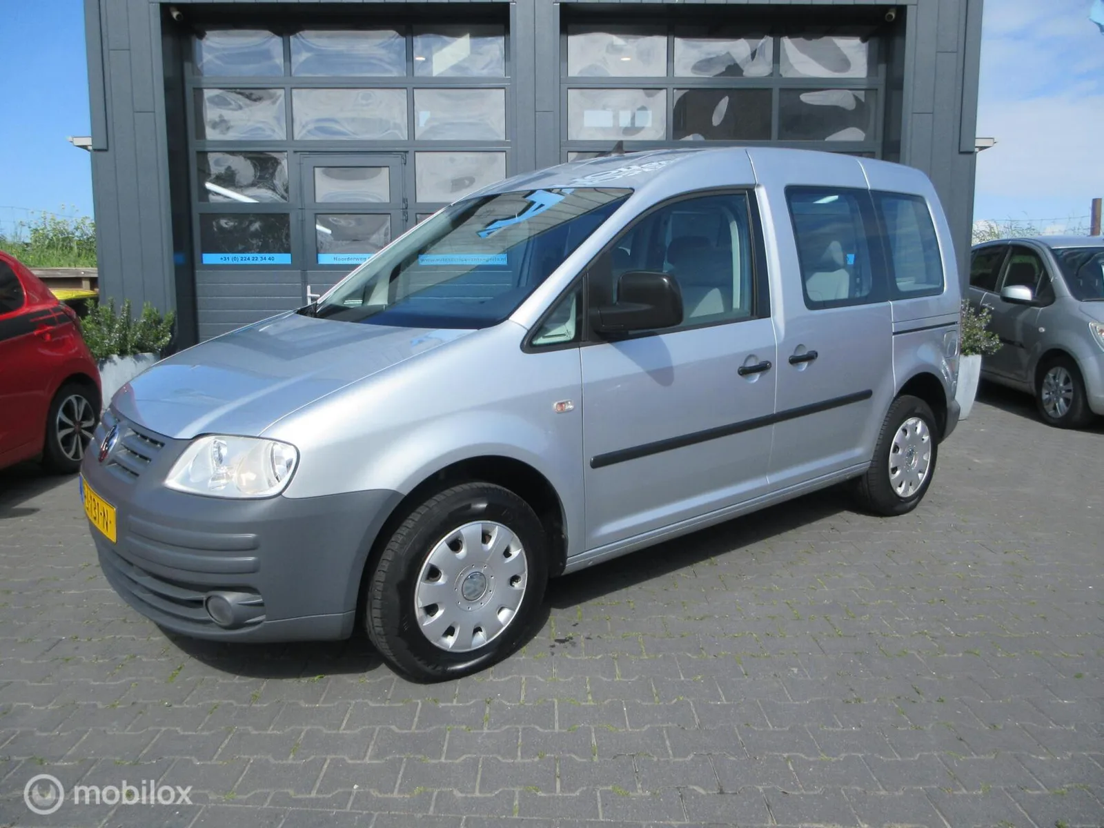 Volkswagen Caddy (2009) — foto 1