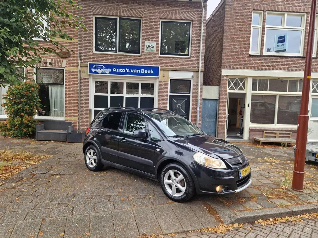 Suzuki SX4 (2007) — foto 1