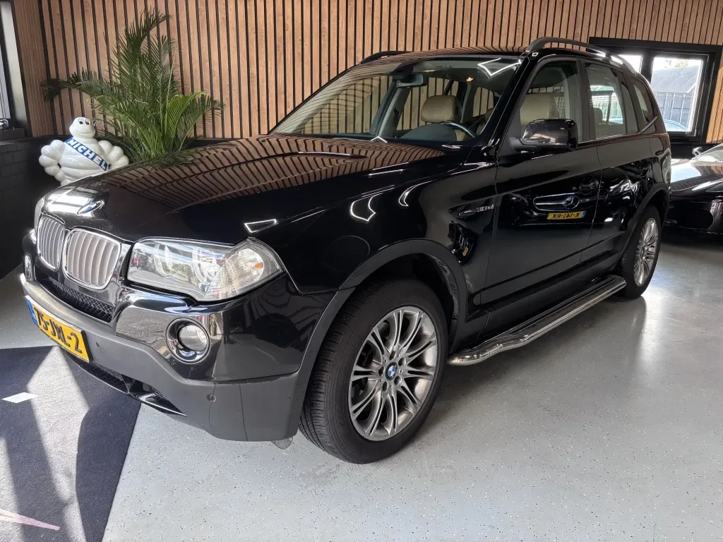 BMW X3 (2009) — foto 1