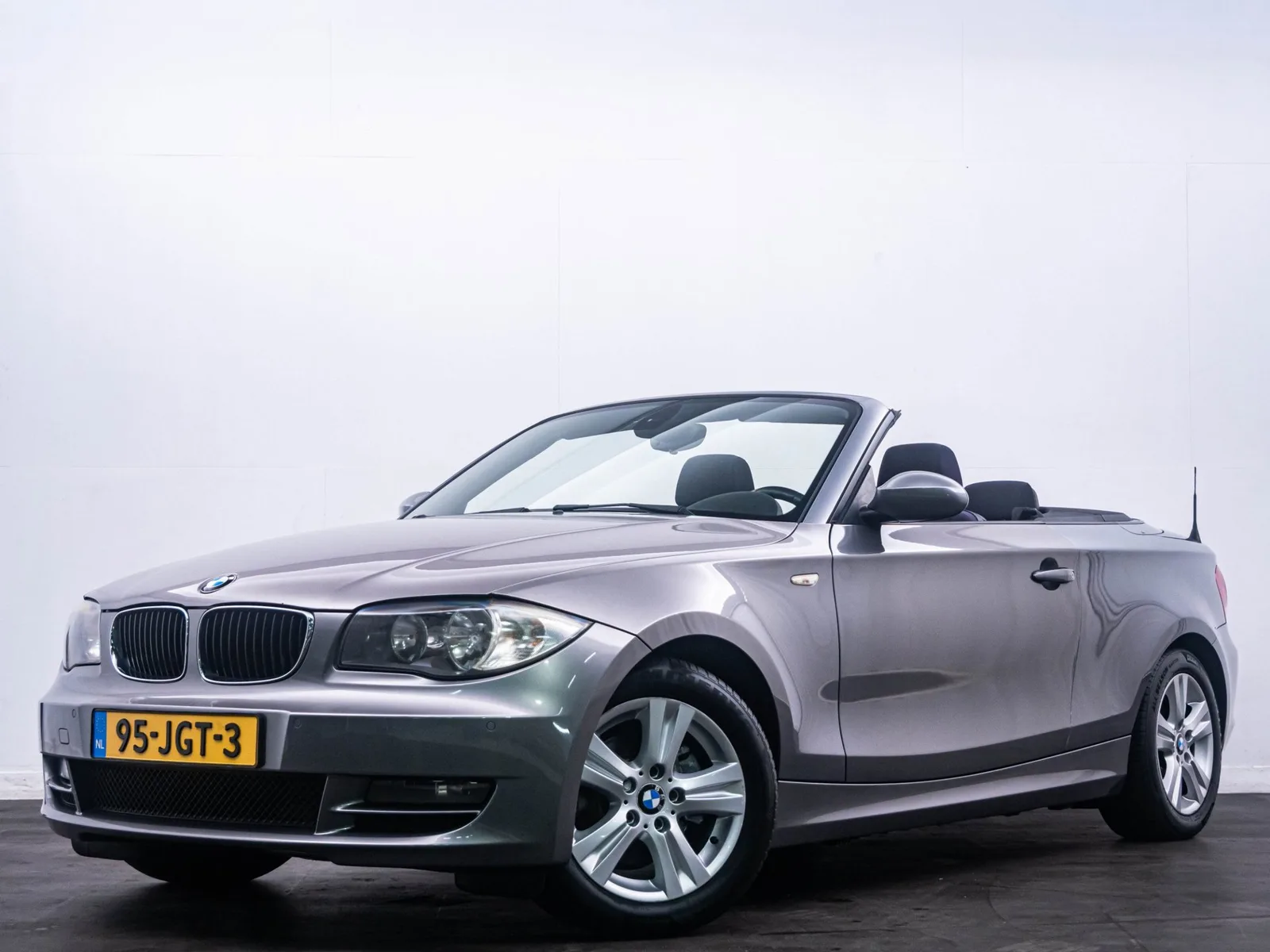 BMW 1-Serie (2009) — foto 1