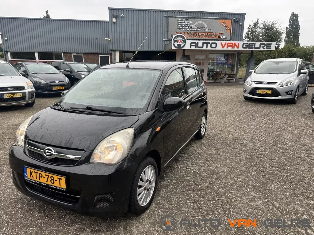 Daihatsu Cuore (2007) — foto 1
