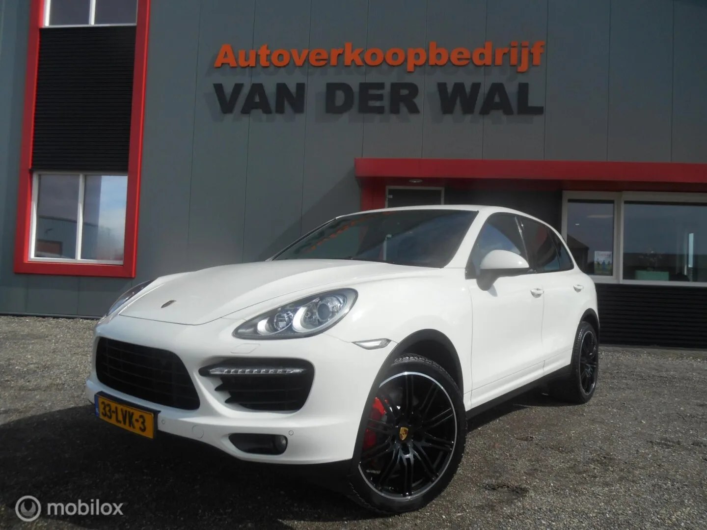 Porsche Cayenne (2010) — foto 1