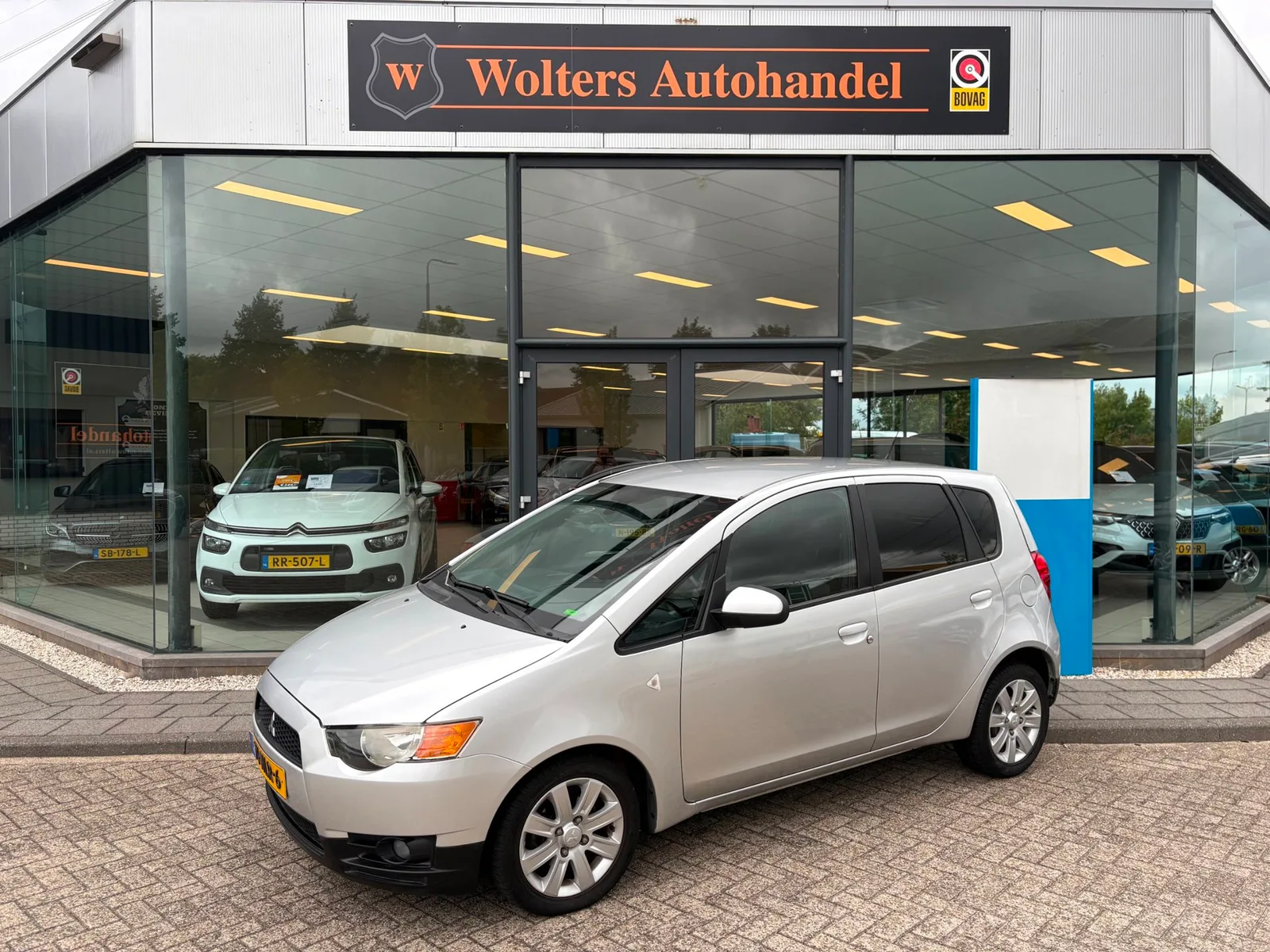 Mitsubishi Colt (2010) — foto 1