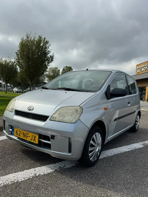 Daihatsu Cuore (2003) — foto 1