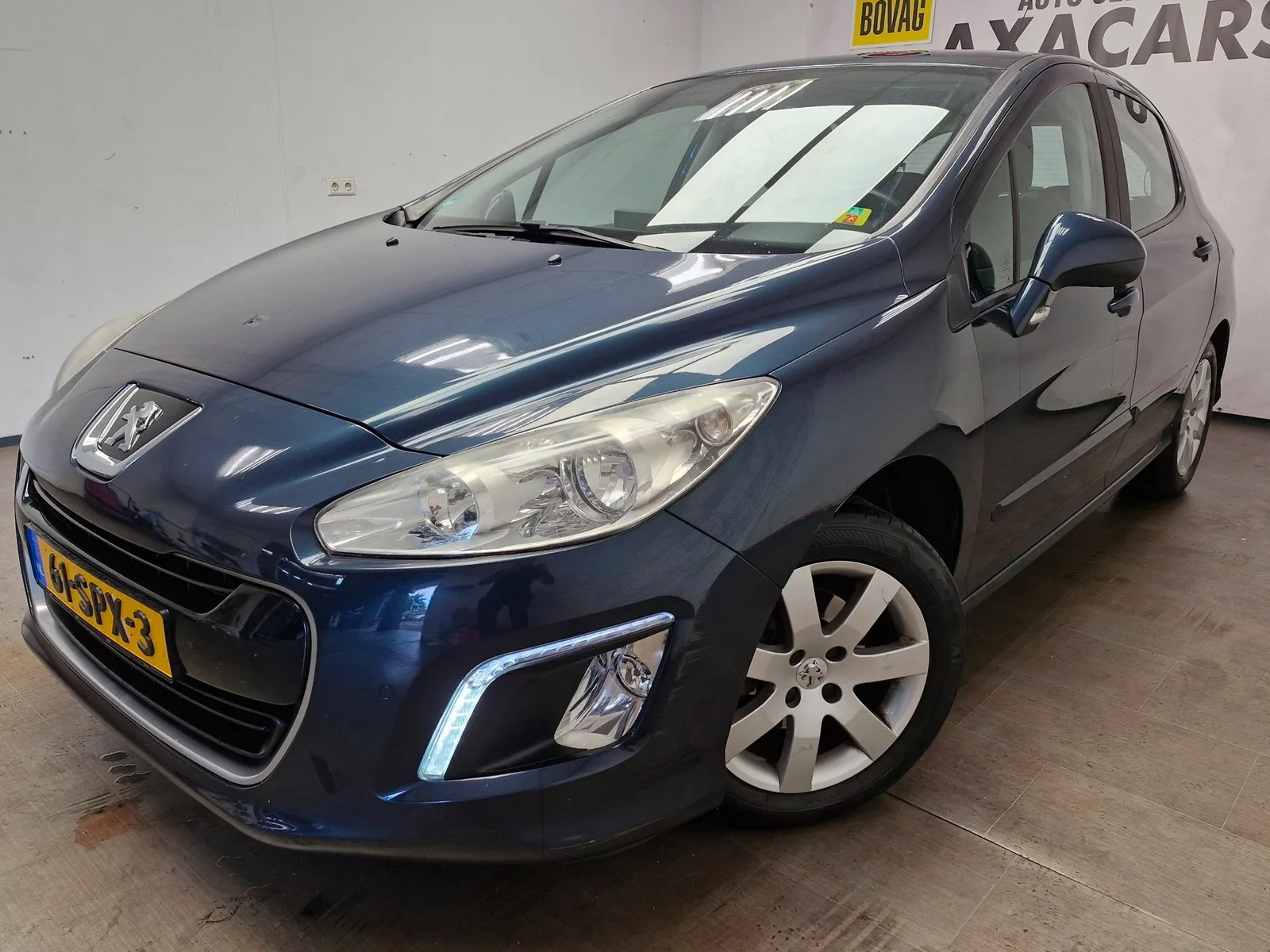 Peugeot 308 (2011) — foto 1