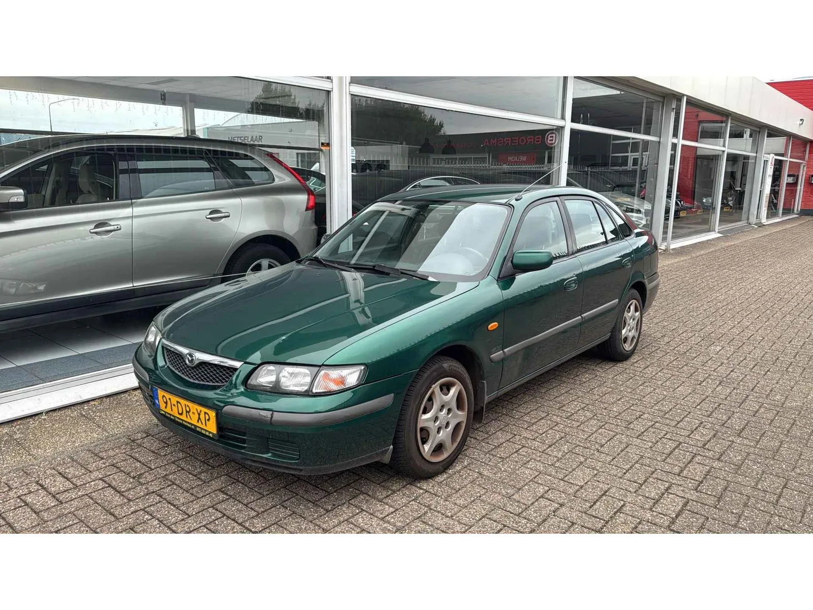 Mazda 626 (1999) — foto 1