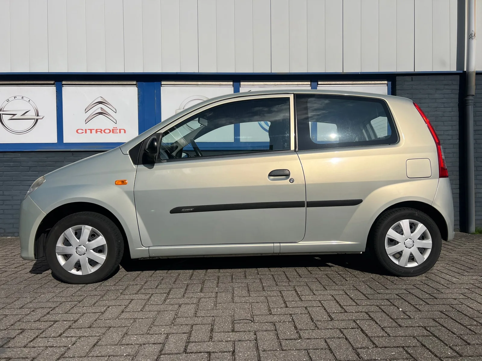 Daihatsu Cuore (2007) — foto 1
