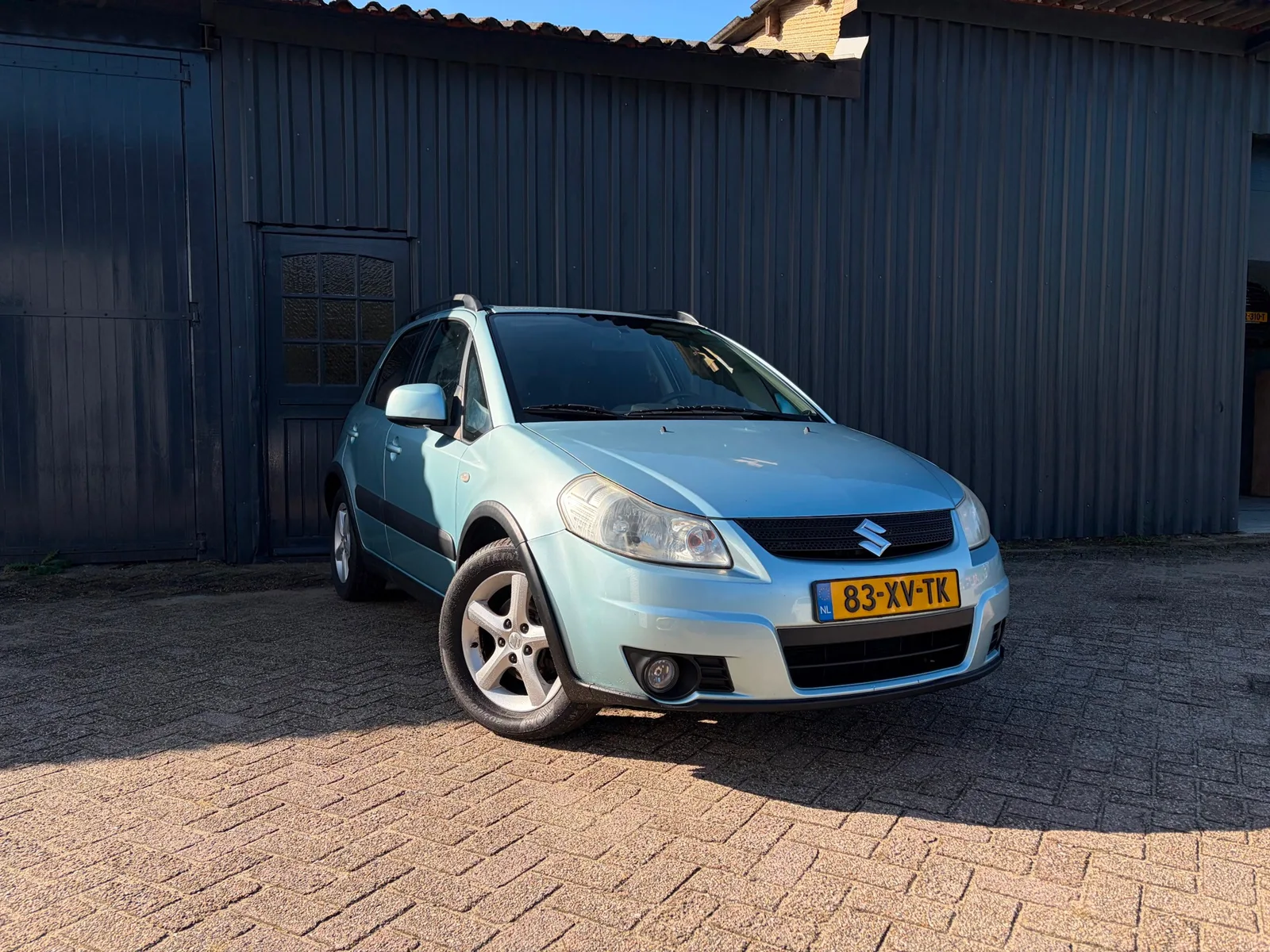 Suzuki SX4 (2007) — foto 1