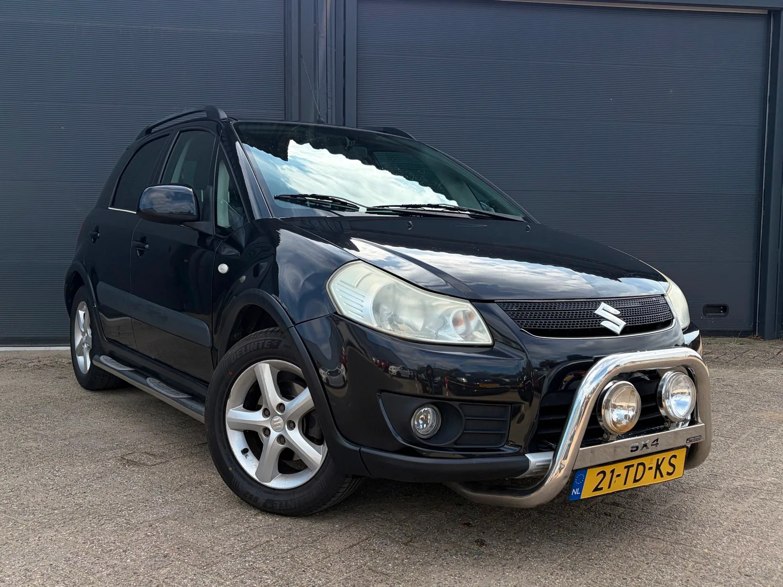 Suzuki SX4 (2006) — foto 1