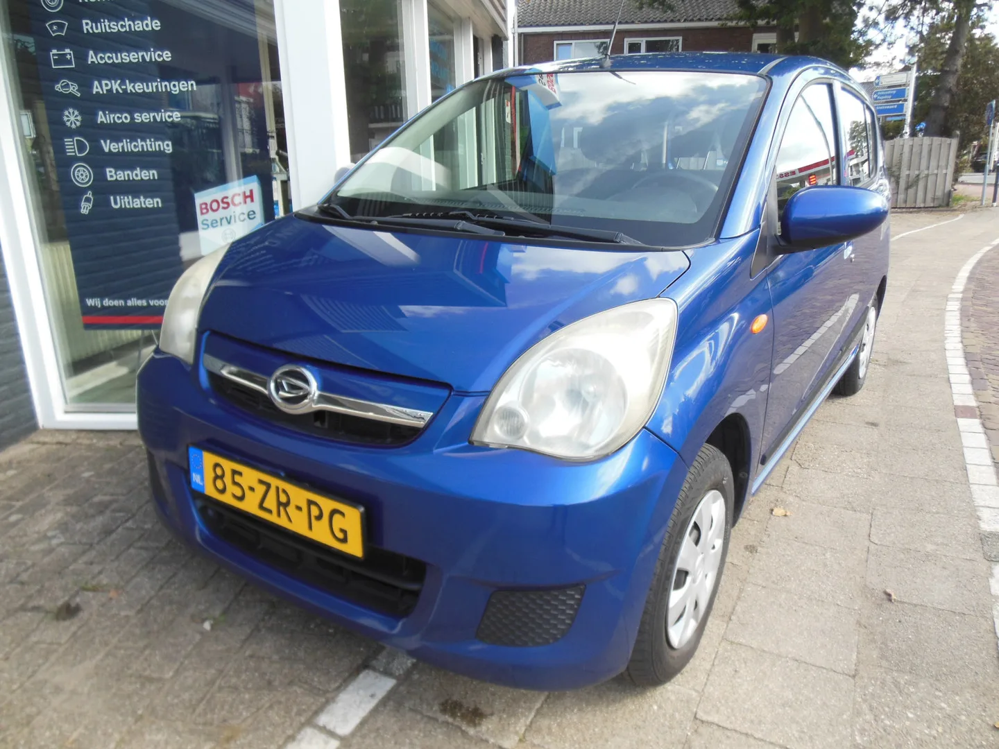 Daihatsu Cuore (2008) — foto 1