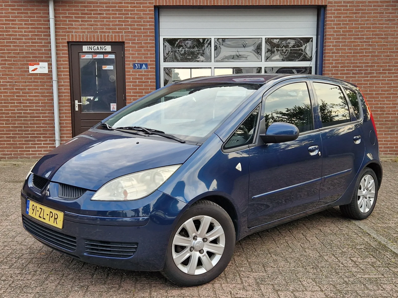 Mitsubishi Colt (2008) — foto 1