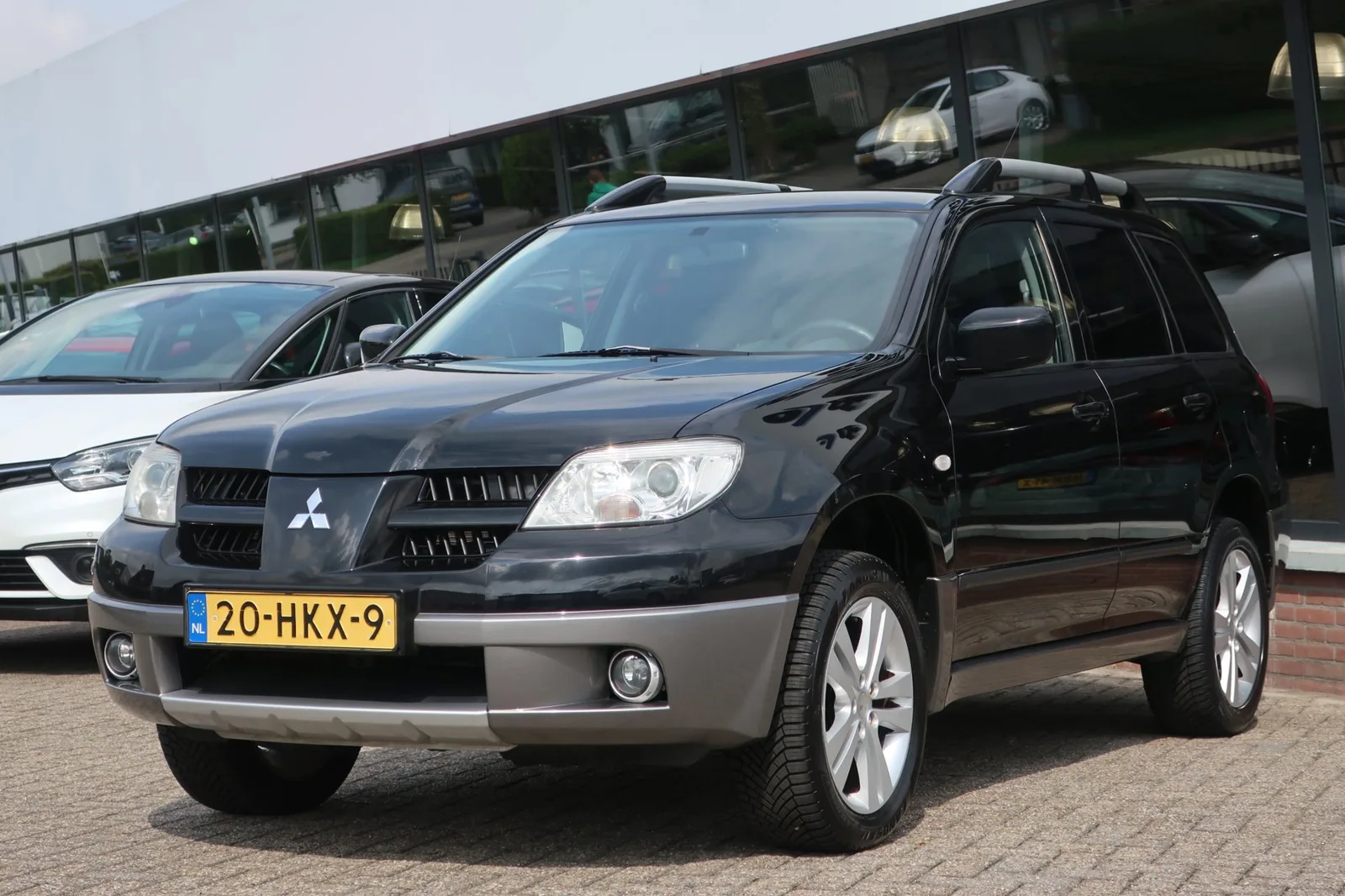 Mitsubishi Outlander (2009) — foto 1