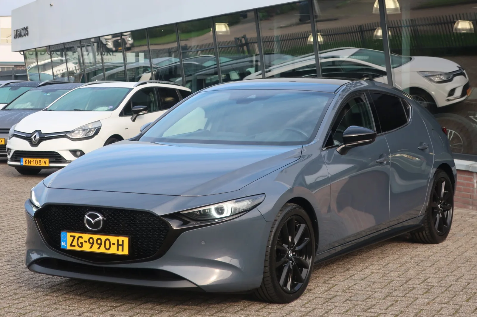 Mazda 3 (2019) — foto 1