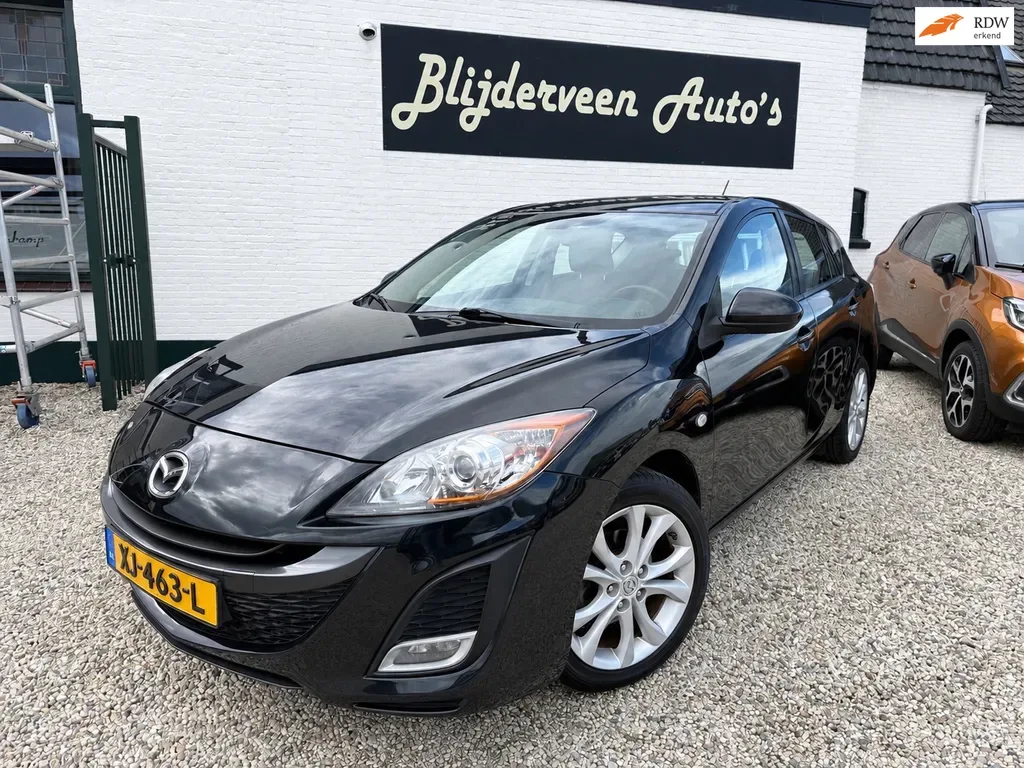 Mazda 3 (2011) — foto 1
