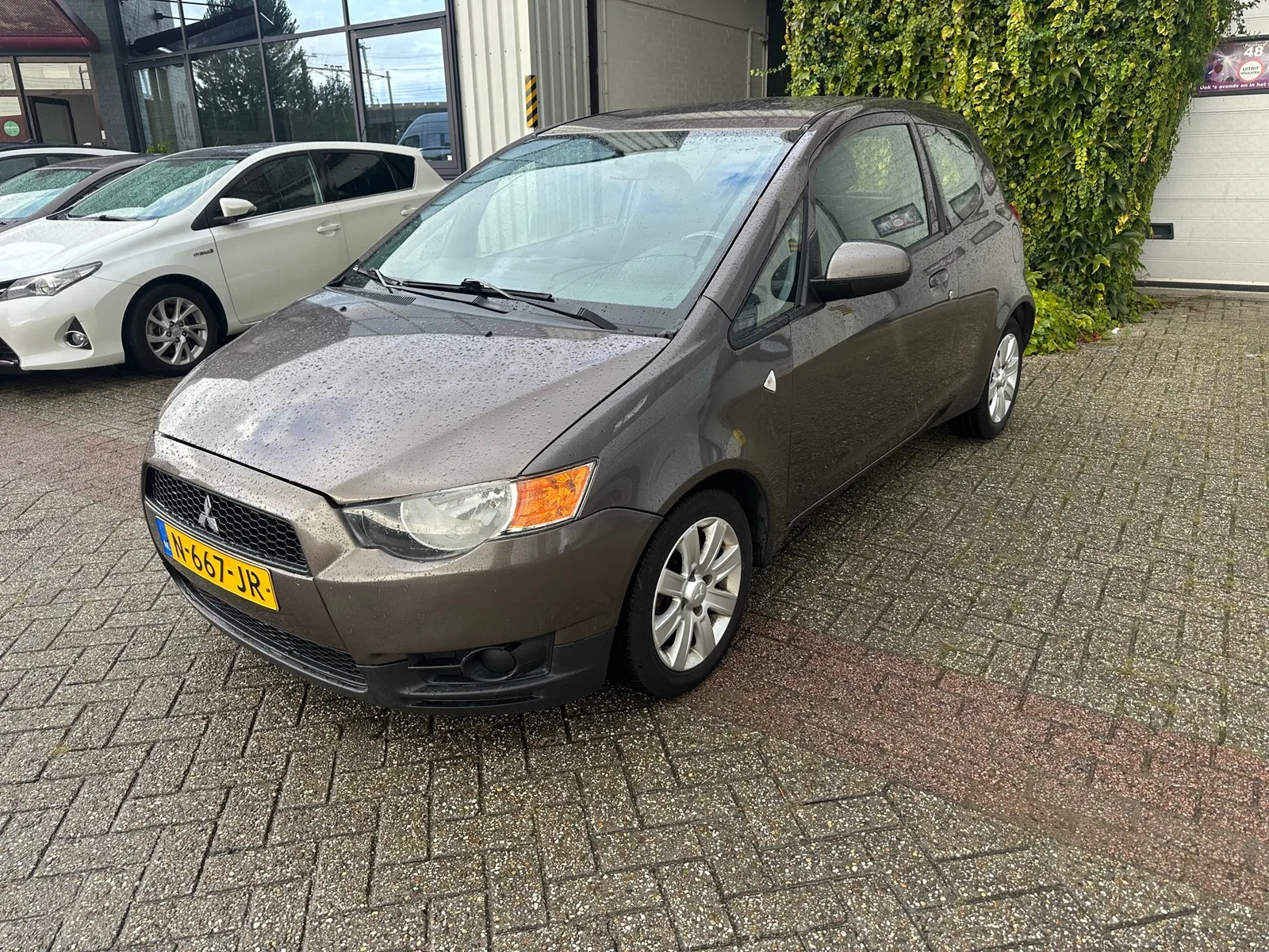 Mitsubishi Colt (2011) — foto 1