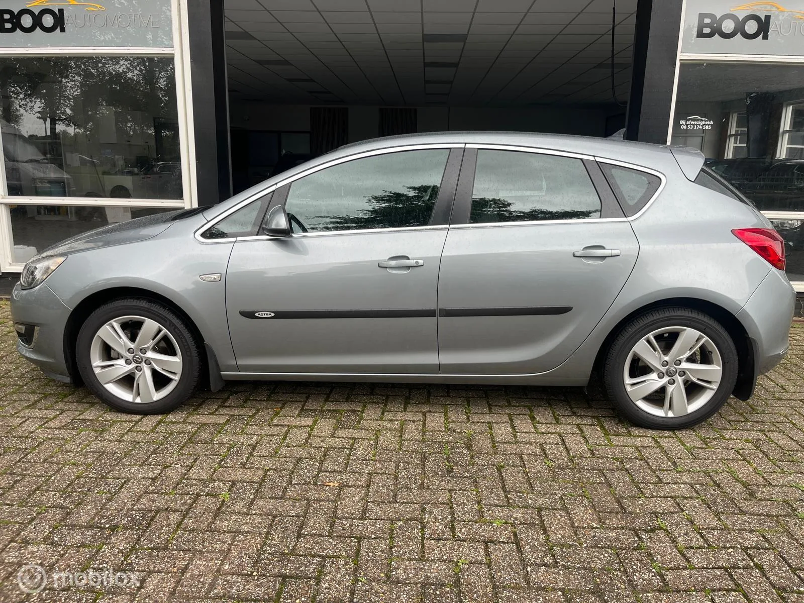 Opel Astra (2013) — foto 1