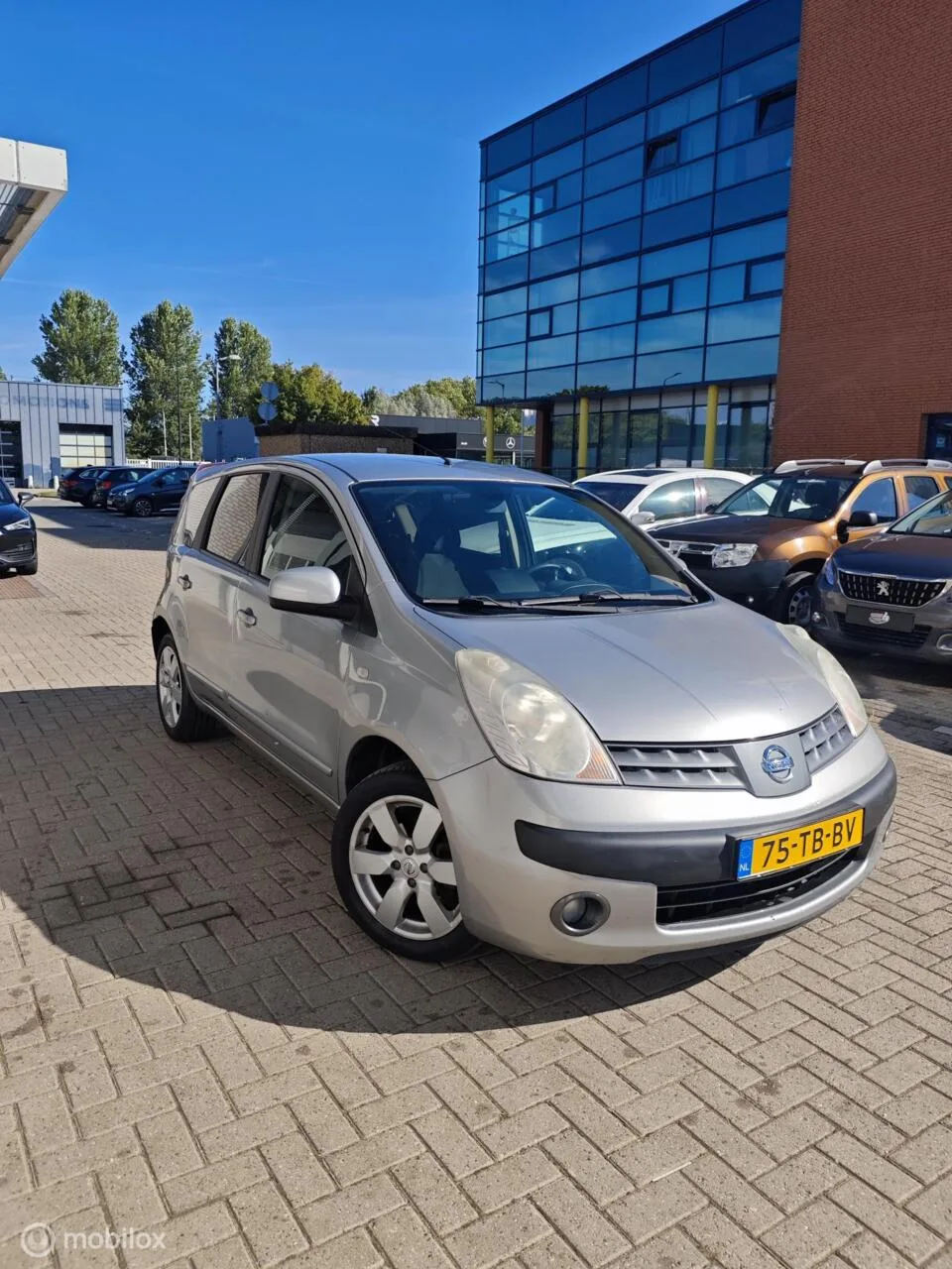 Nissan Note (2006) — foto 1