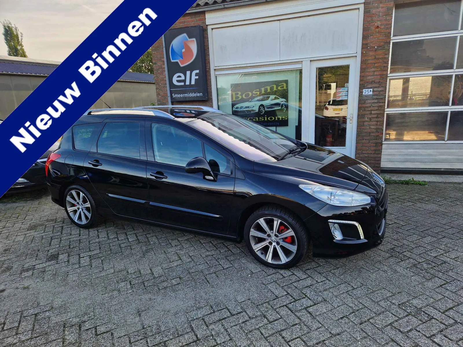 Peugeot 308 (2011) — foto 1