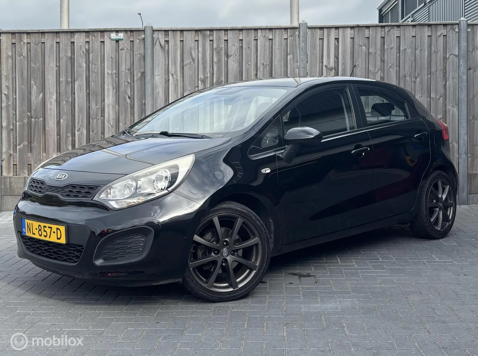 Kia Rio (2013) — foto 1