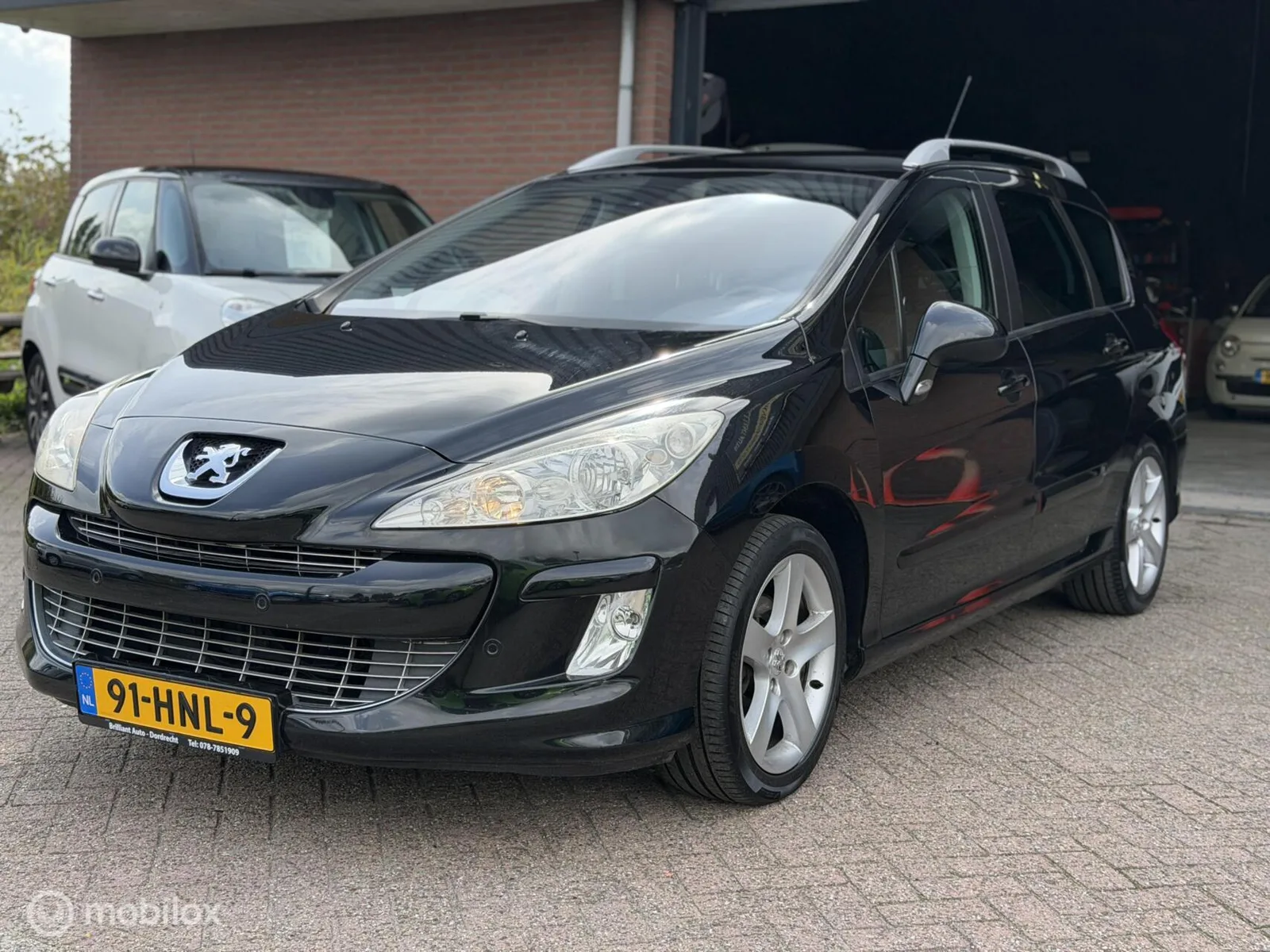 Peugeot 308 (2009) — foto 1