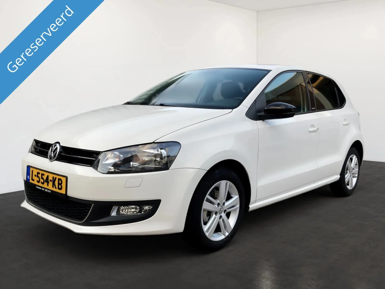 Volkswagen Polo (2011) — foto 1