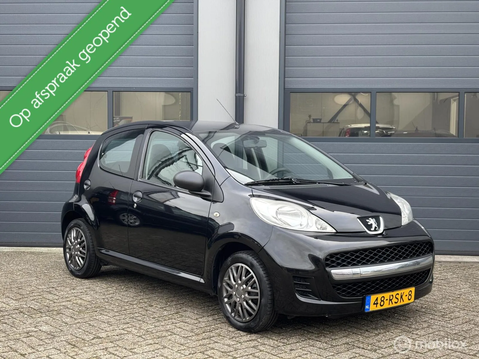 Peugeot 107 (2011) — foto 1