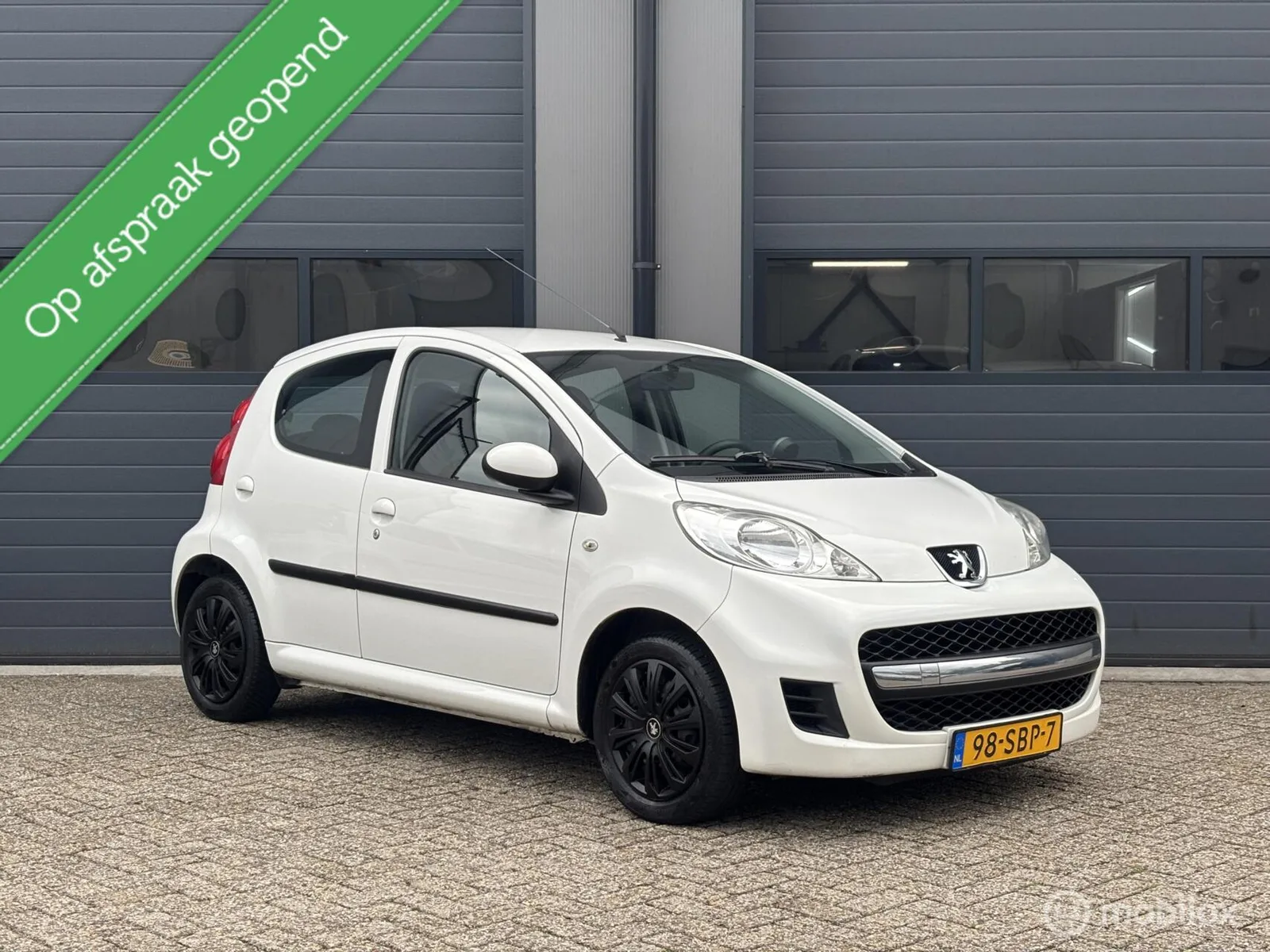 Peugeot 107 (2011) — foto 1