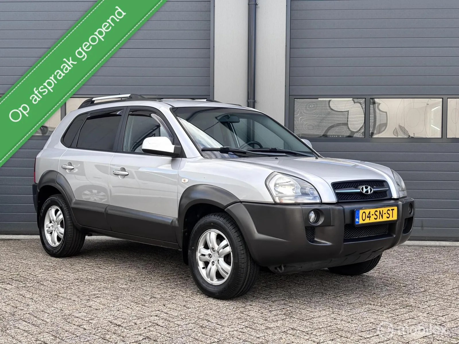 Hyundai Tucson (2006) — foto 1
