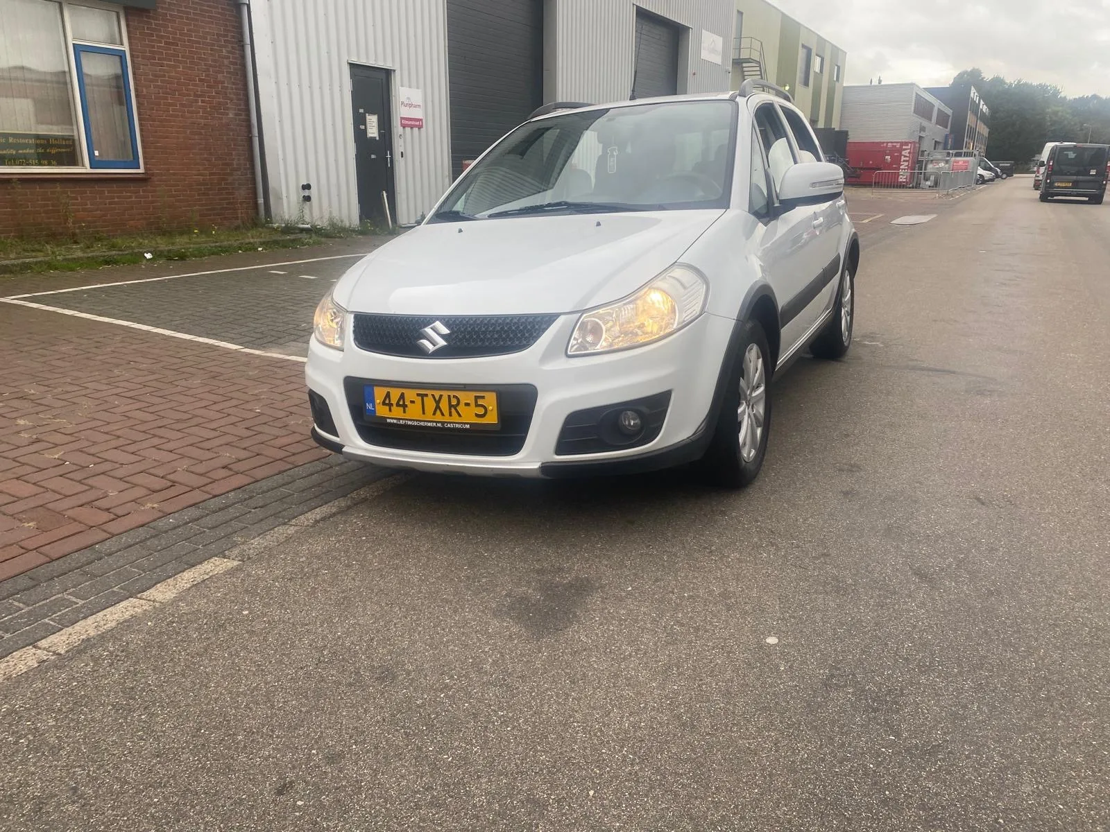 Suzuki SX4 (2012) — foto 1