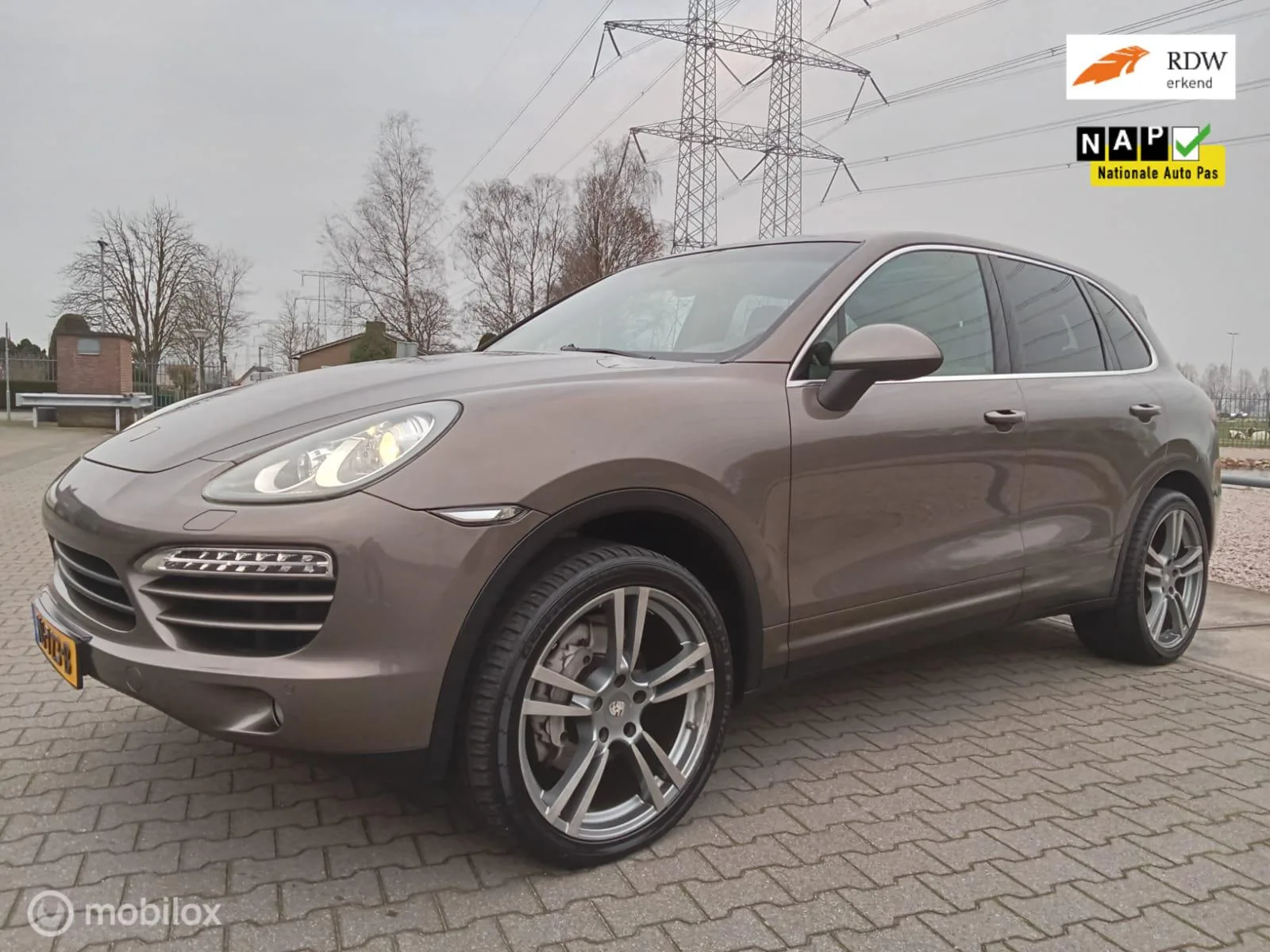 Porsche Cayenne (2012) — foto 1