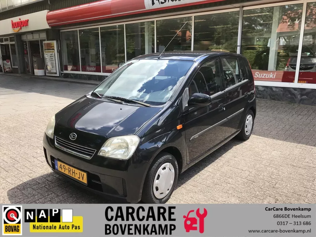 Daihatsu Cuore (2005) — foto 1