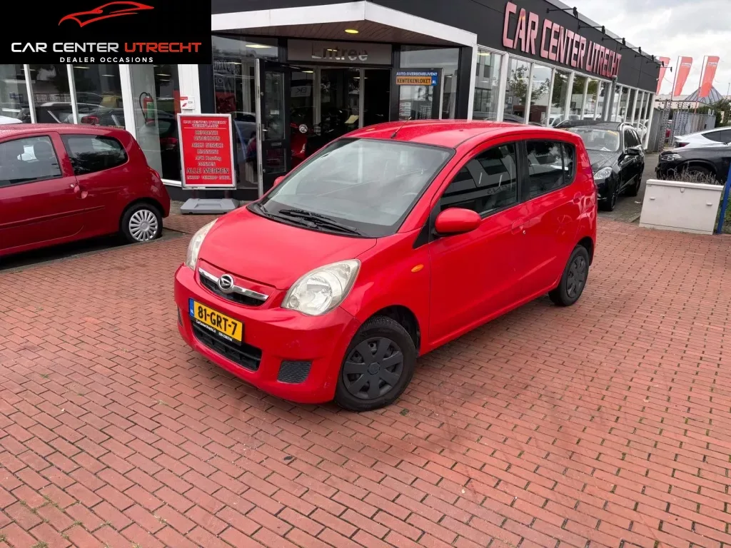 Daihatsu Cuore (2008) — foto 1