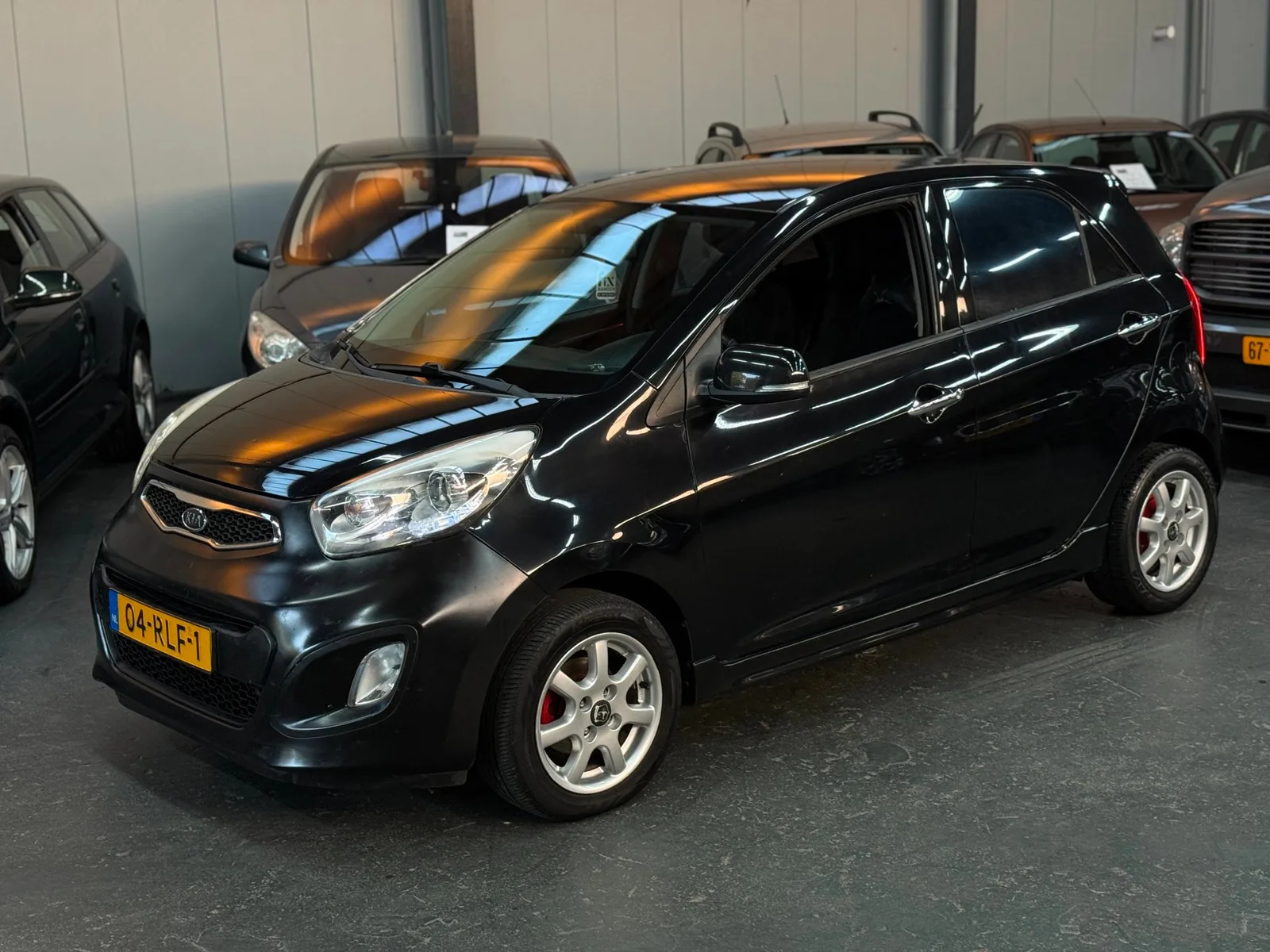 Kia Picanto (2011) — foto 1