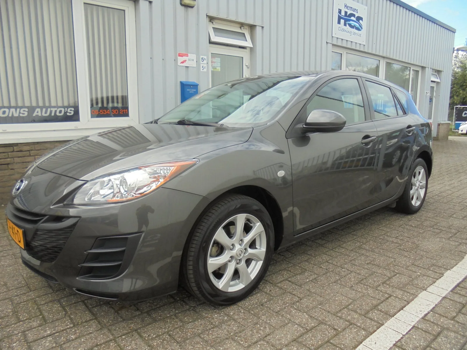 Mazda 3 (2010) — foto 1
