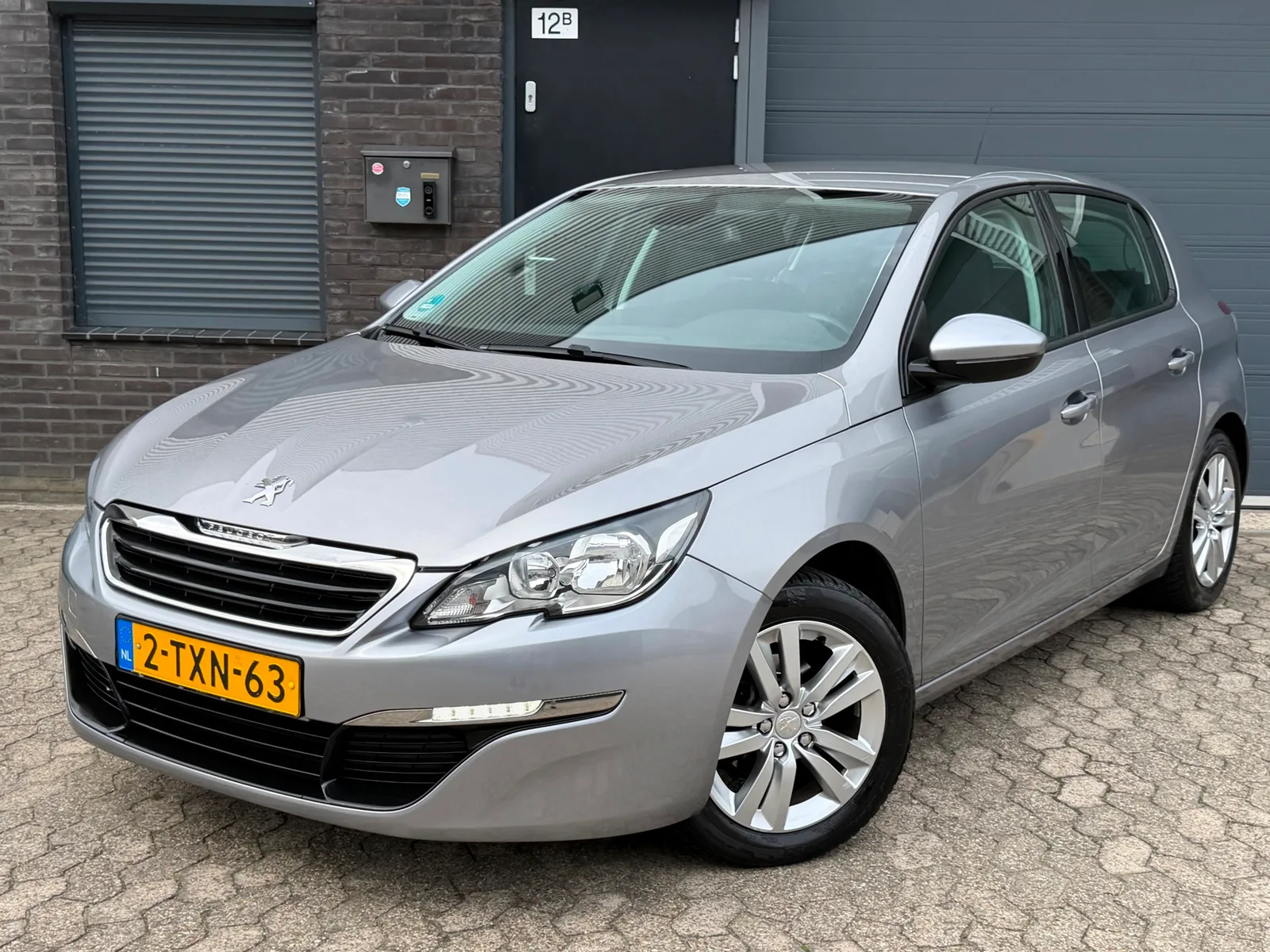 Peugeot 308 (2014) — foto 1