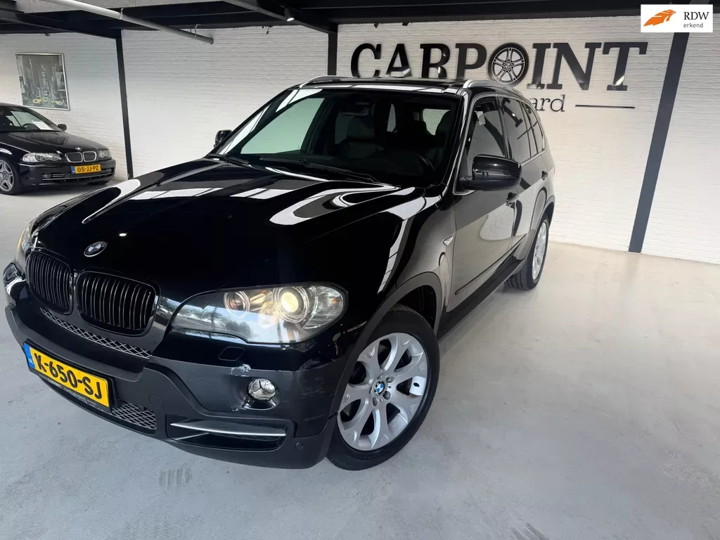 BMW X5 (2010) — foto 1