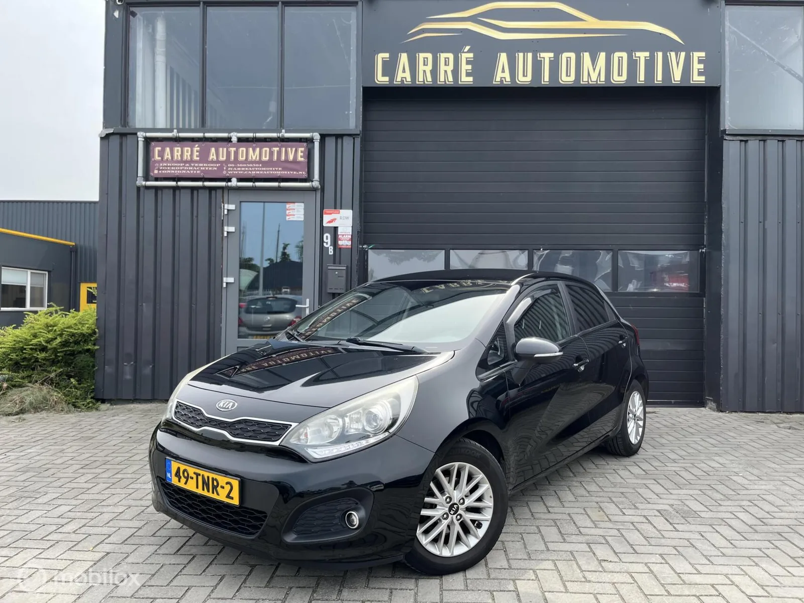 Kia Rio (2012) — foto 1