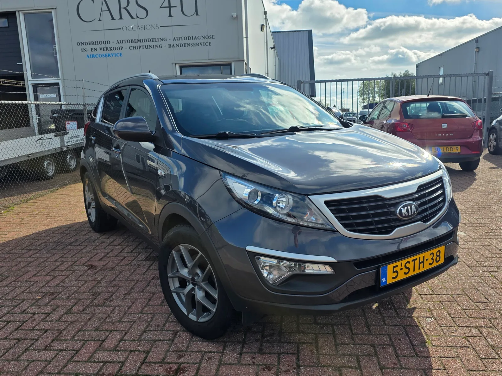 Kia Sportage (2014) — foto 1