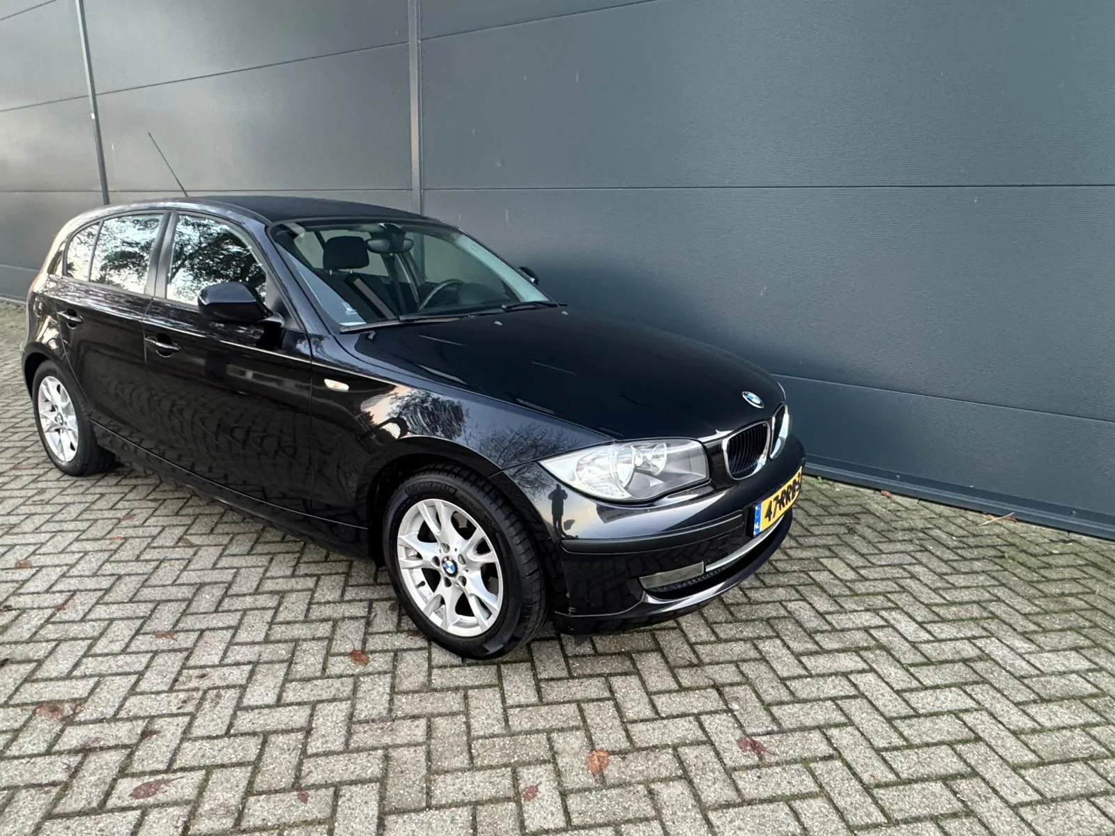 BMW 1-Serie (2010) — foto 1