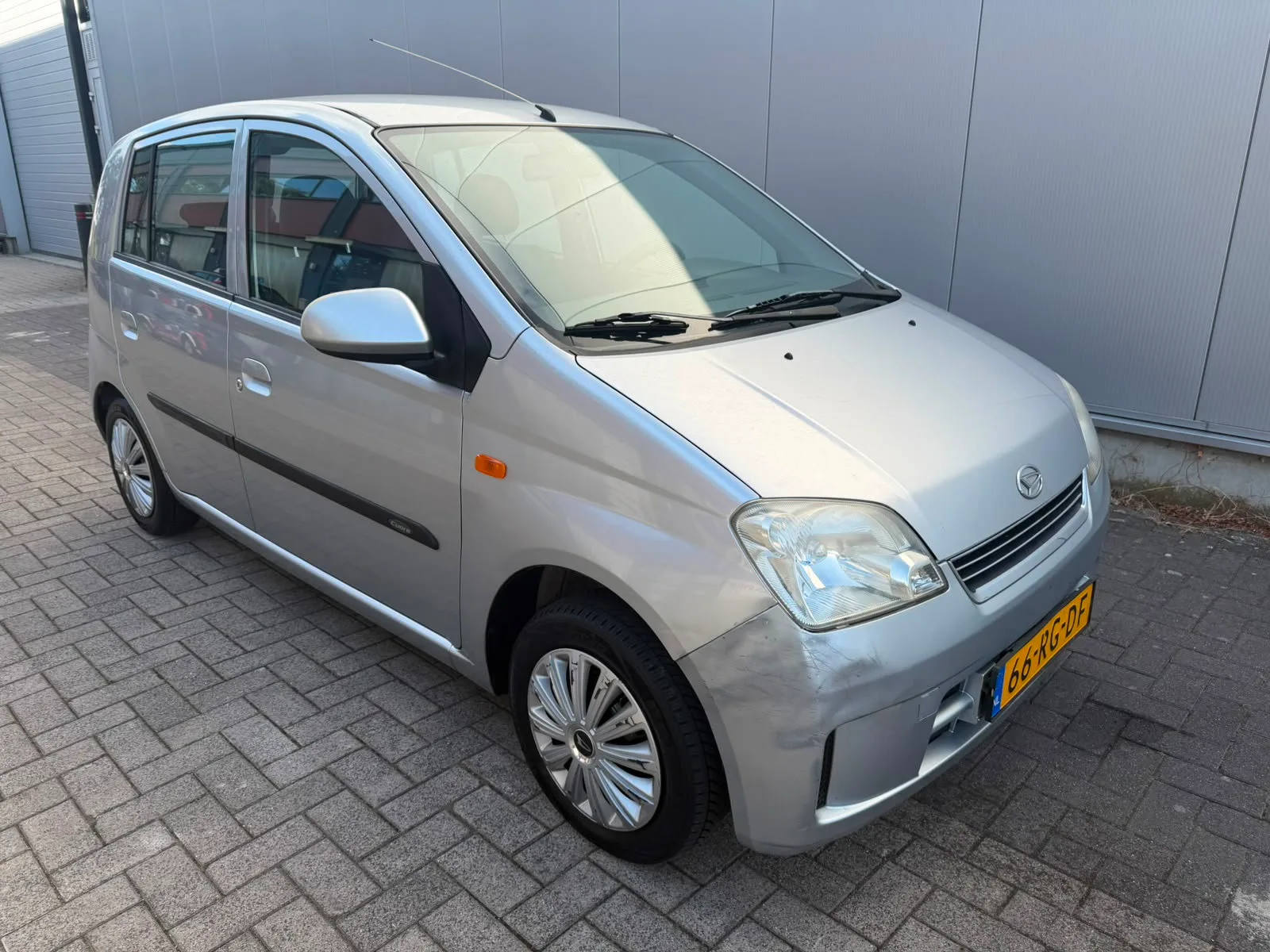 Daihatsu Cuore (2005) — foto 1