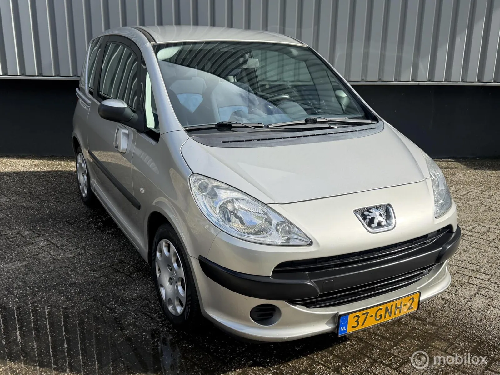 Peugeot 1007 (2006) — foto 1
