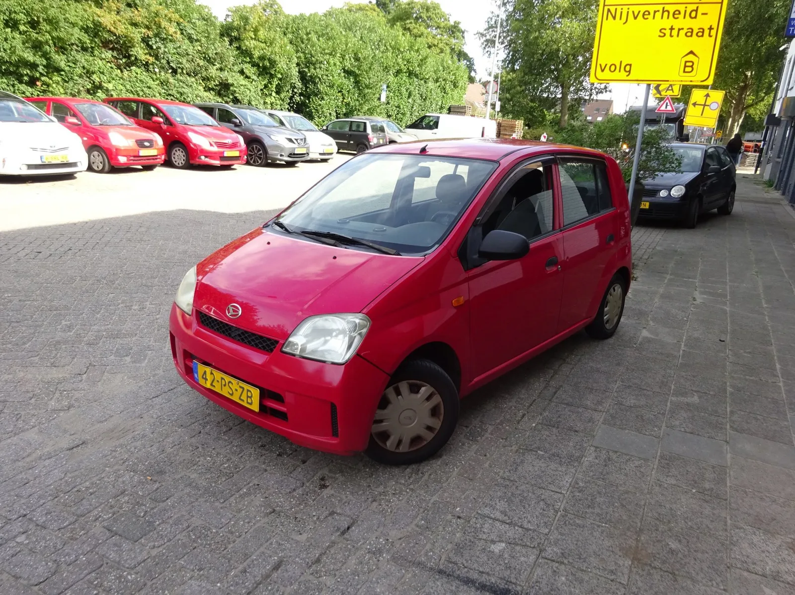Daihatsu Cuore (2004) — foto 1